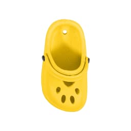 A yellow paw-shaped clog shoe fridge magnet with ventilation holes and a black button detail.