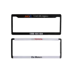 Two plastic licence plate frames in black and white, featuring logos and branding.