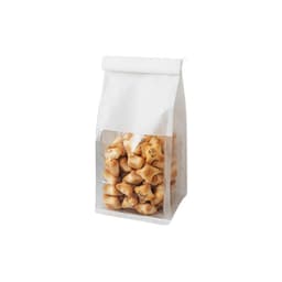 A transparent storage bag containing assorted light brown snack pieces, featuring a white top and branding on the front.