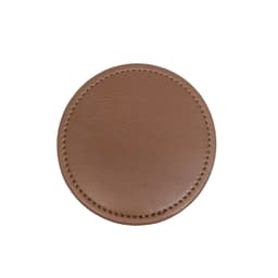A brown PU coaster with a smooth texture and stitched edges. It features a logo in the centre.