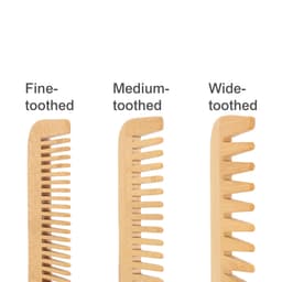 A set of three eco-friendly bamboo combs: fine-toothed, medium-toothed, and wide-toothed. Each comb displays a natural bamboo colour.
