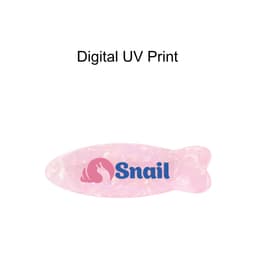 A fish-shaped hair clip in iridescent pink, featuring a logo in blue.