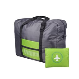 A grey and lime green compressed travel bag with a handle and a small pouch attached.