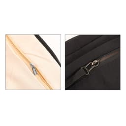 A close-up of two zippers on a lightweight crossbody bag, featuring a beige interior and a black exterior.