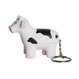 A cow-shaped stress reliever in white and black, attached to a keyring. It features a simple design and a metallic keychain.
