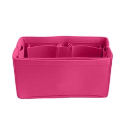 A pink felt bag organiser featuring multiple compartments for storage and organisation. It has a simple, smooth design.