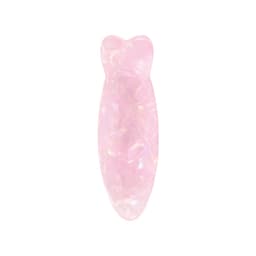 A pink, iridescent hair clip shaped like a fish, featuring a glossy finish and smooth contours.