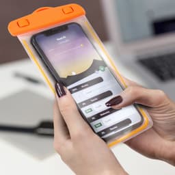 A waterproof phone bag in bright orange, securely holding a smartphone with a visible screen interface.