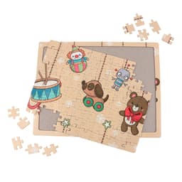 A custom jigsaw puzzle featuring colourful cartoon characters and festive elements, with pieces scattered around.