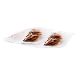 A transparent storage bag containing several snacks, featuring a glossy white hue and an organised layout.