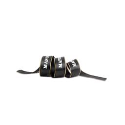 A black ribbon with gold edges, featuring a logo, displayed in a coiled arrangement.