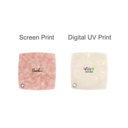 A pink acetate vanity mirror with a marbled effect on the left and a white one with a printed logo on the right.
