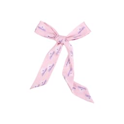 A pink chiffon narrow scarf with a tied bow design, featuring printed text and floral accents.