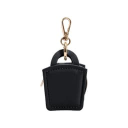 A black mini PU leather jewellery box with a gold clip. It features a small handle and zip closure.