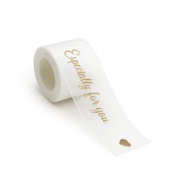A roll of white organza ribbon with a gold printed message, featuring a small heart design.