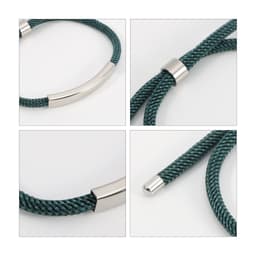 A metal woven bracelet featuring a dark green woven design and sleek silver accents.