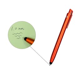 An orange ballpoint pen with a sleek design and a clip, displaying writing on a green notepad.
