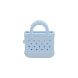 A light blue Mini EVA Holes Bag Clip features a textured surface and handles, with multiple perforations.