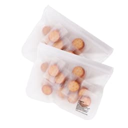 Transparent storage bags displayed, containing small biscuits or crackers. The bags are clear and feature a logo.