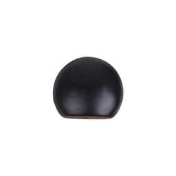 A black round charging case for True Wireless Earbuds, featuring a smooth surface and four indicator lights.