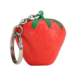 A red strawberry-shaped stress reliever attached to a silver keyring, featuring green leaves on top.