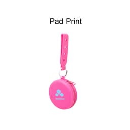 A pink silicone pouch with a strap and a metal clip, featuring a logo on the front.