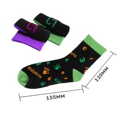 A pair of black socks with colourful patterns, including green, orange, and purple, featuring a logo.