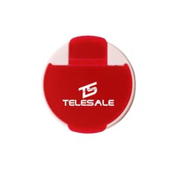 A round pill box in red and white with a branded logo on the front.