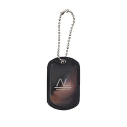 A dog tag with a black rubber silencer and a silver chain, featuring a logo on the front.