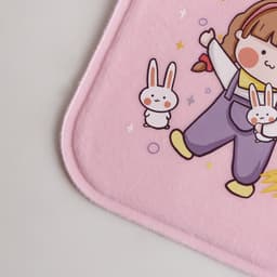 A pink plush cover featuring a cartoon character with bunnies, part of a hot water bottle design.
