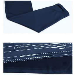 A navy polyester spandex raglan jacket featuring a stand-up collar and quarter-zip design, with a patterned detail.
