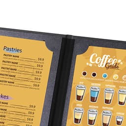 A black menu cover featuring a vibrant yellow coffee guide and a list of pastries with prices.