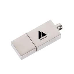 A silver flash drive with a logo displayed on its surface. The design is sleek and compact.
