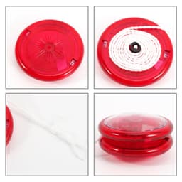 A red yoyo with a white string, featuring a circular design and a central hub, showcasing its glossy exterior.