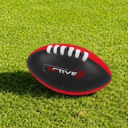 A Mini Aussie Rules Ball in black with red accents, featuring white laces and a logo.