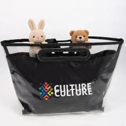 A black tote bag with a detachable PVC cover, featuring two plush toys peeking out from the top.