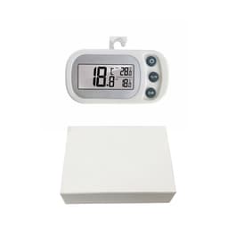 A white ambient thermometer with a digital display showing temperature readings, positioned above a plain white box.