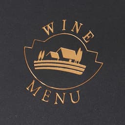 A black menu cover features a gold logo depicting a landscape with houses, labelled “Wine Menu”.