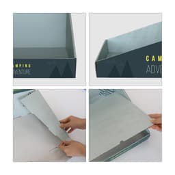 A corrugated cardboard counter display in shades of grey and green, featuring a logo. Display is partially assembled.
