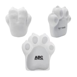 A dog paw-shaped stress reliever in white, featuring a logo on one side.