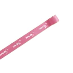 A pink ribbon with gold edges, featuring a branding logo, categorized under print ribbons.