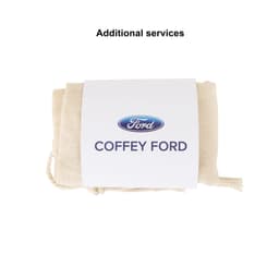 A small cream cotton produce bag tied with a cord, labelled with a logo and additional services note.