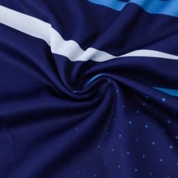 A close-up of a navy blue polyester sports singlet with blue and white stripes and dotted patterns.