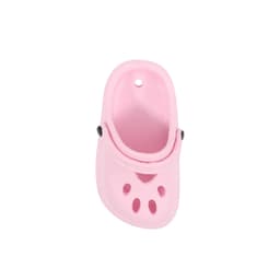 A pink clog shoe-shaped charm featuring ventilation holes and a black button detail.
