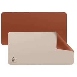 A PU leather desk mat featuring a brown and beige reversible design with a logo on one side.
