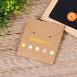 A mini sticky notes and flag set in a brown envelope, featuring pastel-coloured sticky flags. The product has a logo.