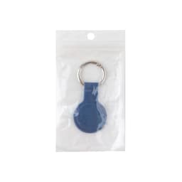 A blue protective case with keyring for an Air Tag, packaged in a clear plastic bag.
