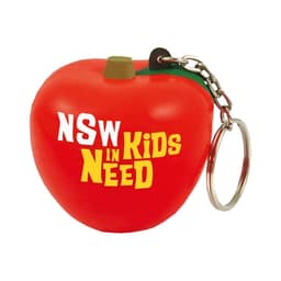 A red apple-shaped stress reliever with a keyring attachment. The apple features a green leaf and a logo.