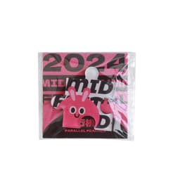 Acrylic fridge magnets in vibrant pink, featuring a playful character design and packaged with branding elements.