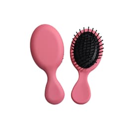 A pink mini paddle brush with a flexible base and black bristles, featuring a logo on the handle.